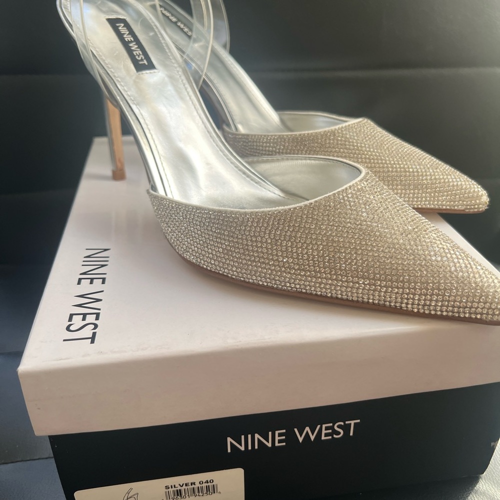 Nine West silver heels never worn.